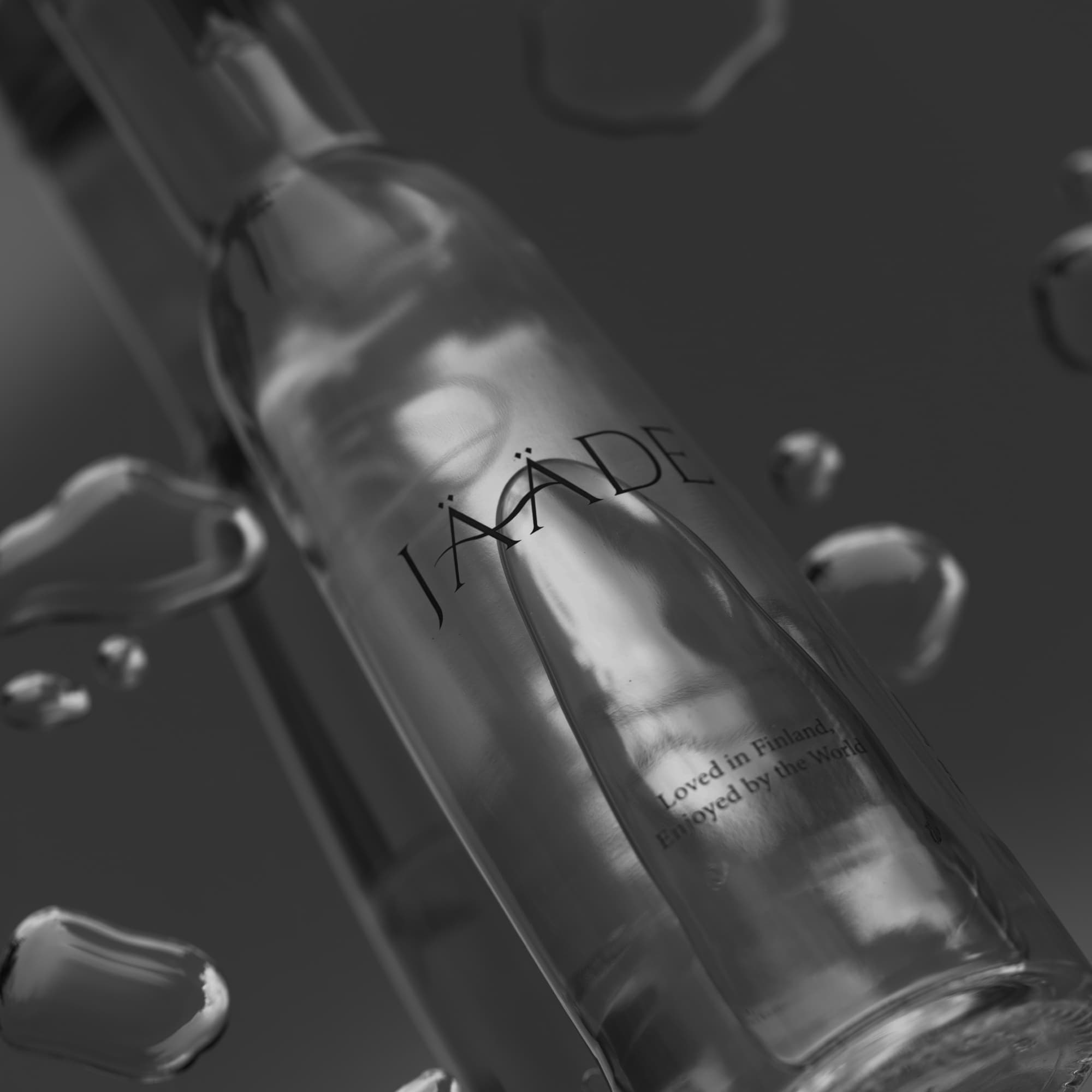 JÄÄDE bottle resting among water droplets